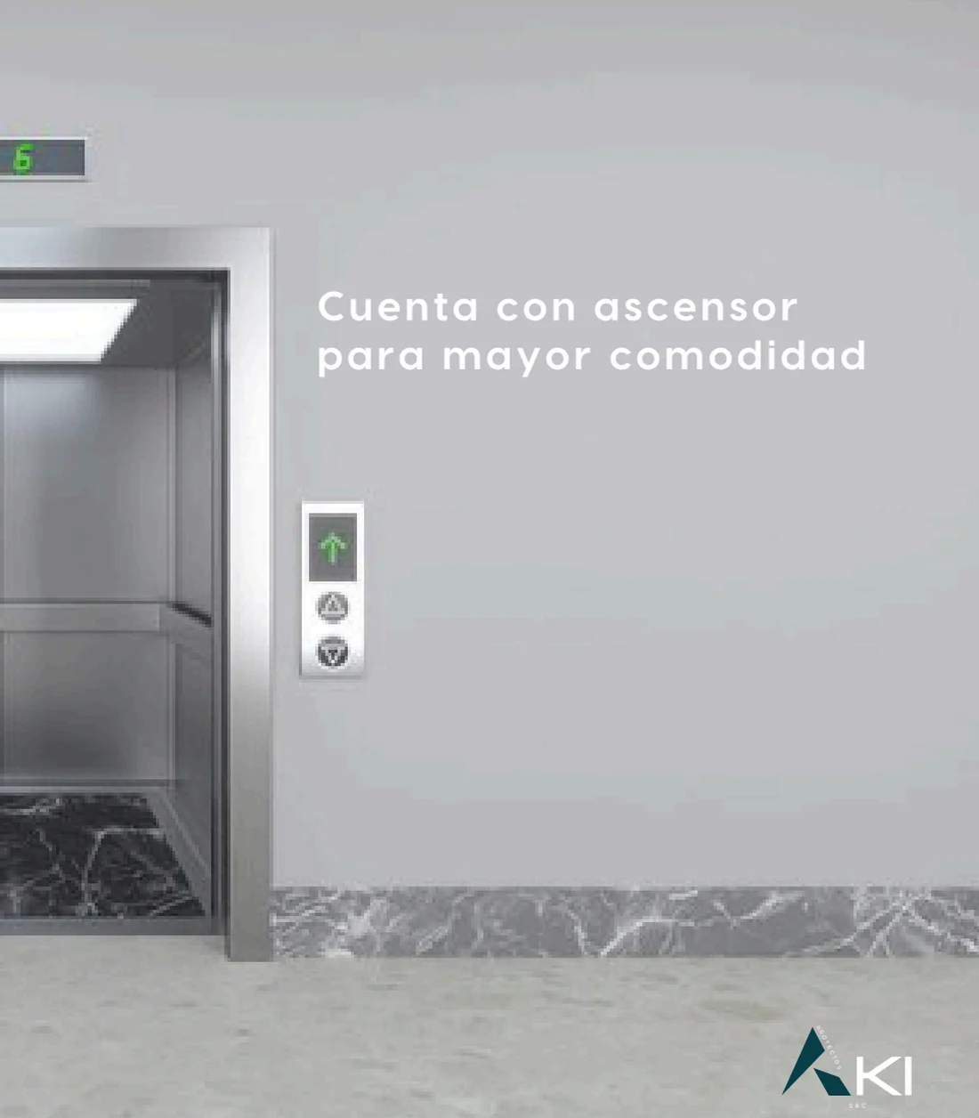 Lobby del Edificio AKI con ascensor y acabados en mármol.